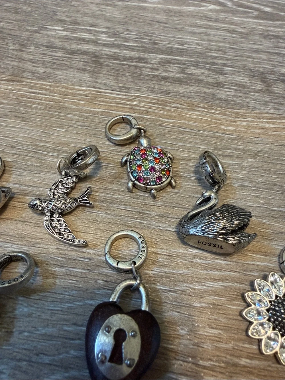 Fossil Silver Tone Adjustable Charm Bracelet 8 Charms Retired Rare